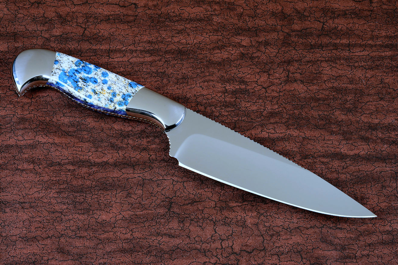 "Andromeda" reverse side view in T3 deep cryogenically treated CPM 154CM powder metal technology high molybdenum stainless steel blade, 304 stainless steel bolsters, K2 Azurite Granite gemstone handle, hand-carved leather sheath inlaid with blue rayskin