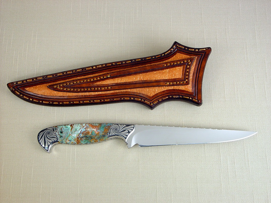 "Eridanus" obverse side view in 440C high chromium stainless steel blade, hand-engraved 304 stainless steel bolsters, Plasma Agate gemstone handle, Elephant skin inlaid in hand-carved leather sheath