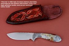 "Chicoma" obverse side view in 440C high chromium stainless steel blade, hand-engraved 304 stainless steel bolsters, Carnival Crazy Lace Agate gemstone  handle, hand-carved, hand-dyed leather sheath