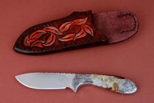 "Chicoma" obverse side view in 440C high chromium stainless steel blade, hand-engraved 304 stainless steel bolsters, Carnival Crazy Lace Agate gemstone  handle, hand-carved, hand-dyed leather sheath