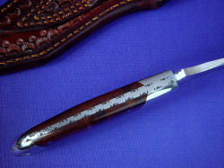 "Mercury" spine filework, edgework detail. Fillework is simple and clean, around handle.