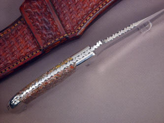 "Mercury Magnum" spine view, filework detail. Note thick spine for strong blade to handle junction, dovetailed bolsters and gemstone handle scales