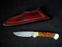 "Mirach" obverse side view in satin finished 440C high chromium stainless steel blade, brass bolsters, African Sandalwood hardwood handle, hand-tooled leather sheath