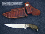 "Pecos II" in 440C high chromium stainless steel blade, hand-engraved nickel silver bolsters, Blue Tiger Eye gemstone handle, horizontal basket weave tooled leather sheath